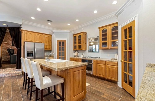 Grove House | 5-Bedrooms on the water! 2 Kitchens, Hot Tub, and Theatre!