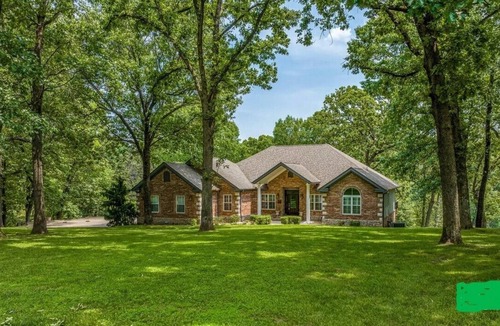 Grove House | 5-Bedrooms on the water! 2 Kitchens, Hot Tub, and Theatre!