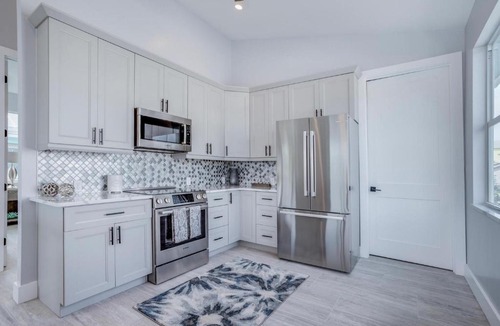Mid Island House | 5541 Palmetto Street by Coastal Vacation Properties