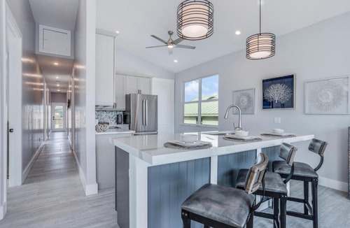 Mid Island House | 5541 Palmetto Street by Coastal Vacation Properties