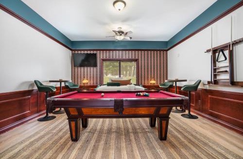 Prudenville House | 6BR Houghton Lake House with Indoor Pool, Hot Tub and Golf Simulator