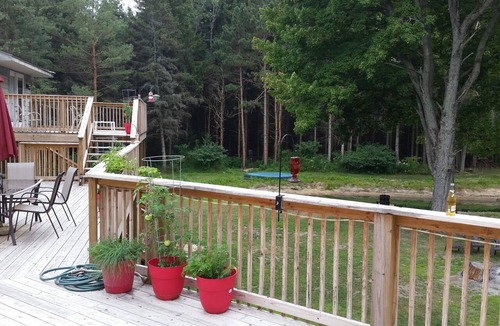 Norton Shores Apartment | 7 Bedrooms/3 Baths Apartment ~ On 5 Acres AC, WIFI, Pond For Fishing, Firepit