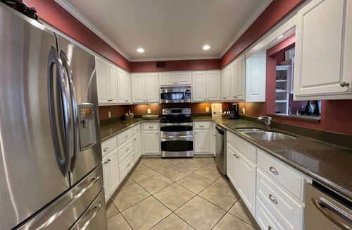 Mount Ida Condo | 80BPD, Four bedroom, two 1/2 bath log-sided condo with lake view , garage by RedAwning
