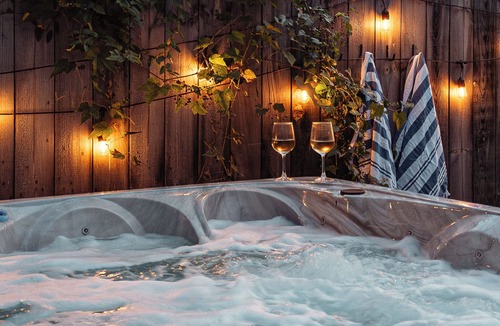 Oakley House | A designer forest retreat near Asheville—hot tub under the trees, fire pit nights, artisan coffee bar mornings, and luxe comfort in the Land of the Sky.