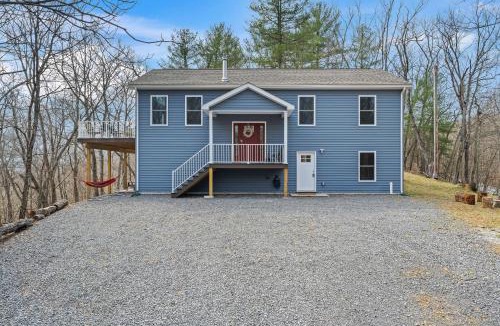 Great Cacapon House | All Decked Up - wifi, view, river access, fire pit, 3 bedrooms, games, family friendly