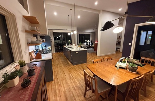 Athens House | Amazing open high ceiling big windows large common room and private backyard.