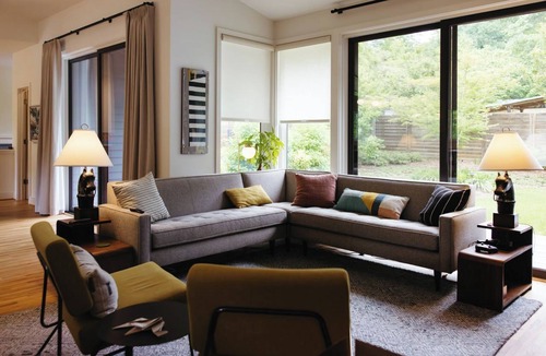 Athens House | Amazing open high ceiling big windows large common room and private backyard.