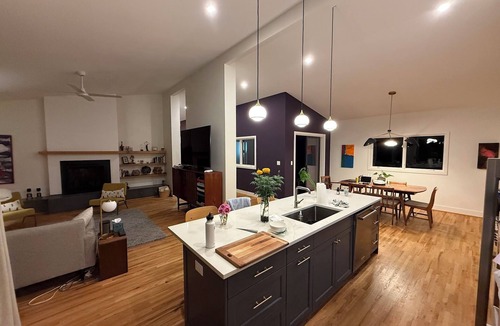 Athens House | Amazing open high ceiling big windows large common room and private backyard.