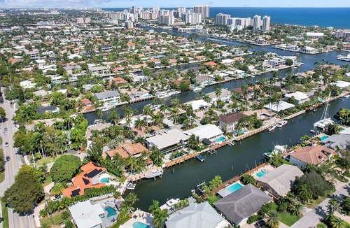 Coral Ridge House | Amazing waterfront 4 BR with Hot tub, Pool and gym