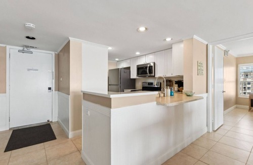 Amelia City Condo | Amelia Surf & Racquet Club B178 | 7th Floor Ocean Front Deluxe Floor Plan | Pools | Tennis Courts | Sleeps 6