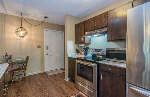 Helen House | BALCONY OVERLOOKING RIVER | DOWNTOWN HELEN