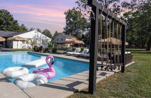 Mason House | Barefoot Tiki Retreat -Inground Heated Pool, Game Rm,Theater Rm,Firepit,Tiki Bar