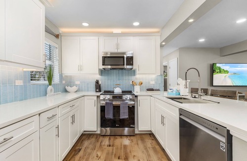 Hills T P House | Beach Haven: 4BR Home, Heated Pool, Walk to Beach!
