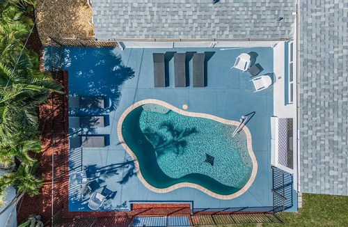 Hills T P House | Beach Haven: 4BR Home, Heated Pool, Walk to Beach!