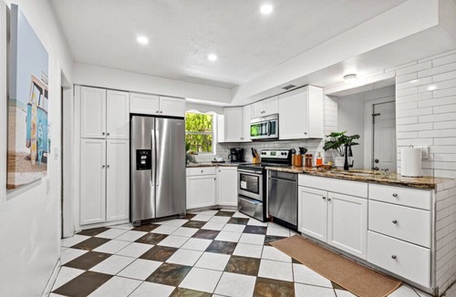 Lantana Heights House | Beachside Escape : Poolhouse w/Game Room + Grill