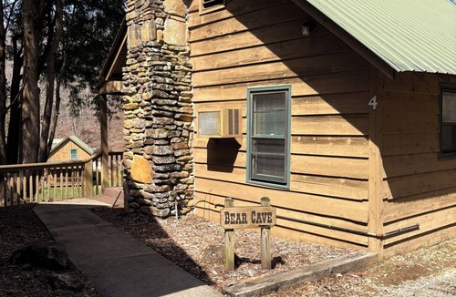 Rabun Gap Cabin | Bear Cave Cabin is perched on a hilltop overlooking Valley Springs lake