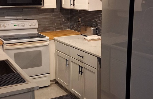 White Lake Condo | Beautiful 2-bedroom condo with natural wood fireplace in charming White Lake
