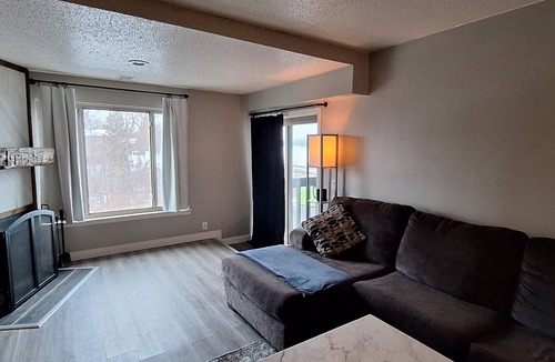 White Lake Condo | Beautiful 2-bedroom condo with natural wood fireplace in charming White Lake