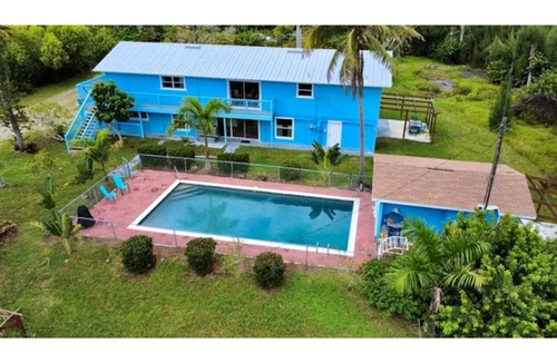 Saint James City House | Beautiful 3bedroom second floor with full kitchen, a pool in pine island