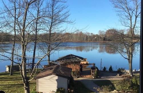Grand Junction House | Beautiful Lake Home with Tiki Bar for EXTRA FUN Home is governed by Ordinance