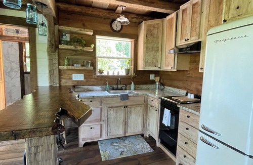 Nebo Cabin | Beautiful Log Cabin nestled on pond w/balcony for sunsets and stargazing.