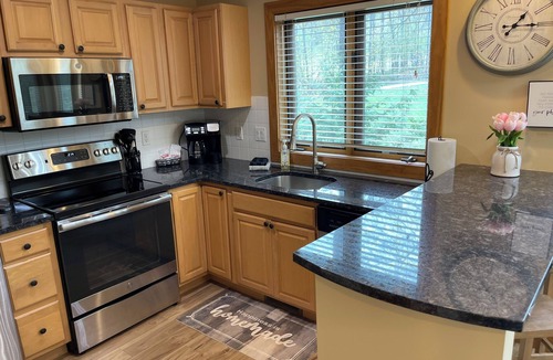 Boyne Falls Condo | BEST LOCATION ON THE MOUNTAIN True Slope Side Ski In/Ski Out to Mountain Express