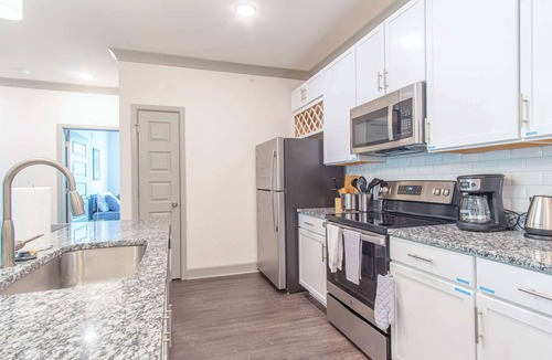 Buechel Apartment | Boulevard Stays Stylish 3BR Getaway Pool, Gym Access & Free Parking