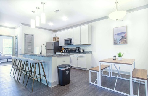 Buechel Apartment | Boulevard Stays Stylish 3BR Getaway Pool, Gym Access & Free Parking