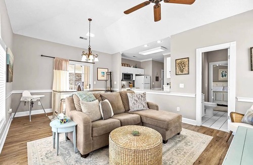 Central Myrtle Beach Apartment | Bright & Cozy Myrtlewood Condo- One Mile to Beach & Broadway with Pools and Golf