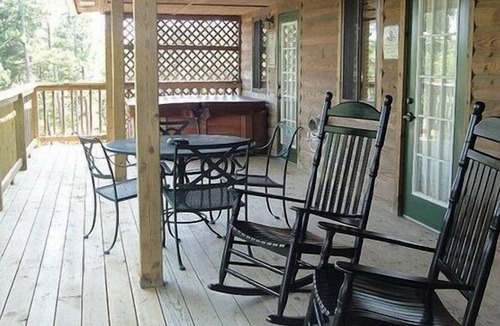 Mount Ida Cottage | C16, Two bedroom, two bath, log-sided Harbor North luxury cottage with hot tub overlooking Lake Ouachita. by RedAwning
