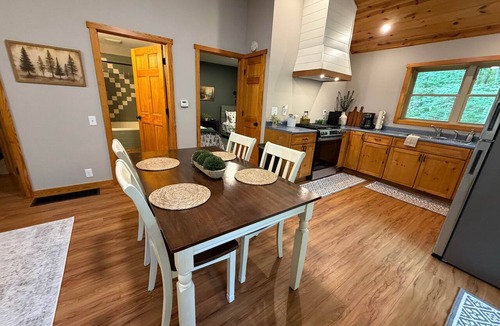 South Bloomingville Cabin | Cabin nestled in the woods, 2-person jacuzzi, fire pit, close to Ash Cave