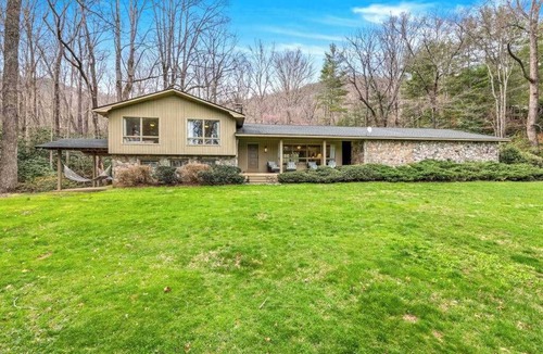 Black Mountain House | Camp Rockmont retreat with hot tub, game room, & outdoor fireplace
