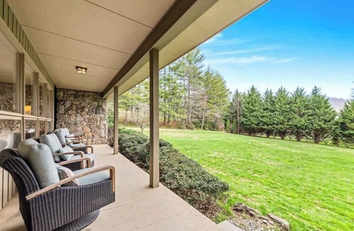 Black Mountain House | Camp Rockmont retreat with hot tub, game room, & outdoor fireplace