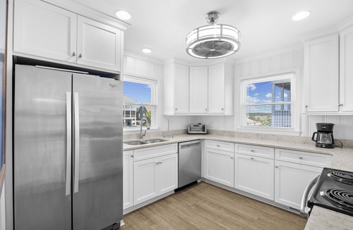 Litchfield by the Sea House | Canal Front Beach House, Screened Porch, 2 TV Dens, Dock, Short Block from Beach