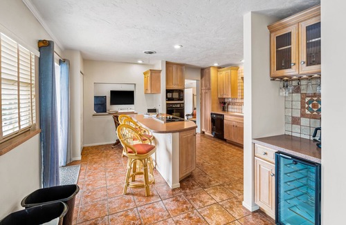 Edgewater House | Canal-front home with deep-water dock, pool, lanai, & central AC - snowbirds OK