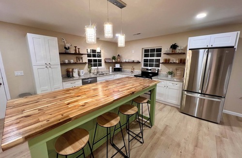Higdon House | Charming 3 bedroom home with elegant speakeasy vibe. Fire pit. Billiards table.