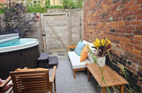 Mount Auburn House | Charming Cottage Downtown - Walk to OTR with Hot Tub & Indoor Fireplace