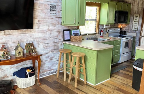Okeechobee Cabin | Charming Gingerbread Cabin on Lake Okeechobee