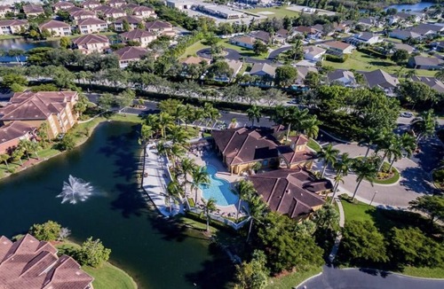 Majestic Palms Condo | Charming lake view 2/2 Florida Condo minutes away from the beach