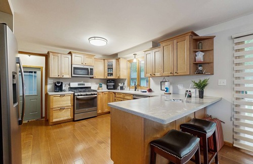 Arbor Vitae House | Charming Lakefront home w/dock, gas grill, fire pit, on ATV/Snowmobile trail