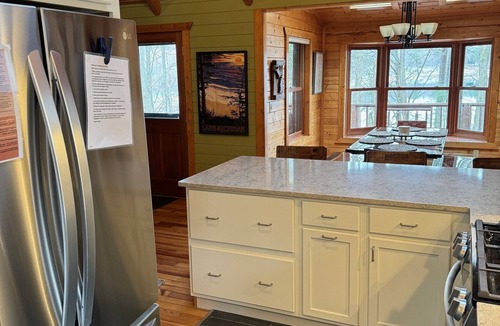 Traverse City House | Charming Log Cabin, Lake Views and Kayaking