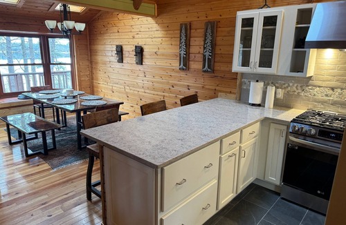 Traverse City House | Charming Log Cabin, Lake Views and Kayaking