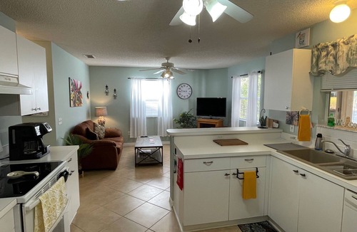 Lady Lake House | Charming Retreat with Lanai & Preserve Views, Golf Cart Included!