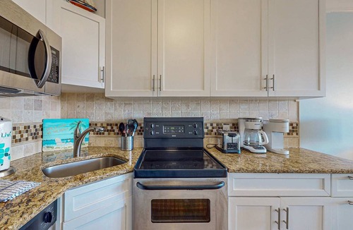North Forest Beach Condo | Charming Waterfront Villa with Ocean Views, Private Balcony & Pool, Steps to the Beach