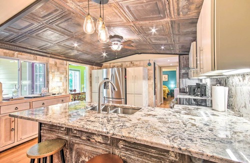 South Carolina Lakes & Blackwater Rivers Cottage | Cheery Swansea Home on Calmont Pond w/Dock!