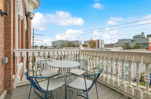 Tulane - Gravier Apartment | Chic 2BR in Historic Schoolhouse w/Private Balcony and Gated Parking