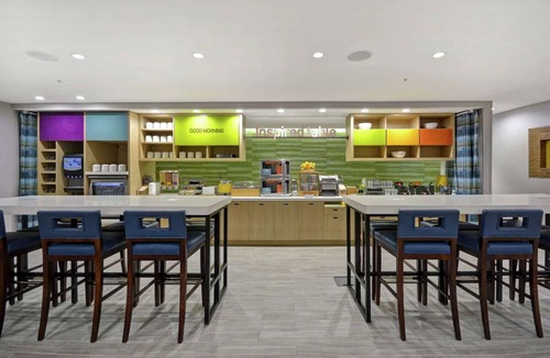 Alpine Center Hotel | City Lights and Comfort Nights: Kitchenette, FREE Breakfast | Pets are Allowed!