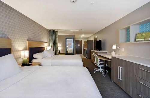 Alpine Center Hotel | City Lights and Comfort Nights: Kitchenette, FREE Breakfast | Pets are Allowed!
