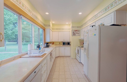 Lake Leelanau Cottage | Classic 1920 cottage, huge lot, loads of parking, boat dock, fire pit, private.