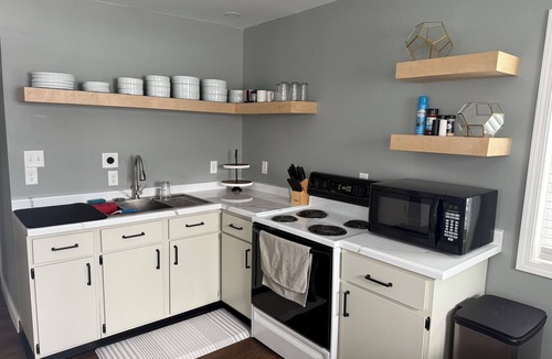 South Range Apartment | Close to trail 2-bedroom unit in South Range for your next getaway.